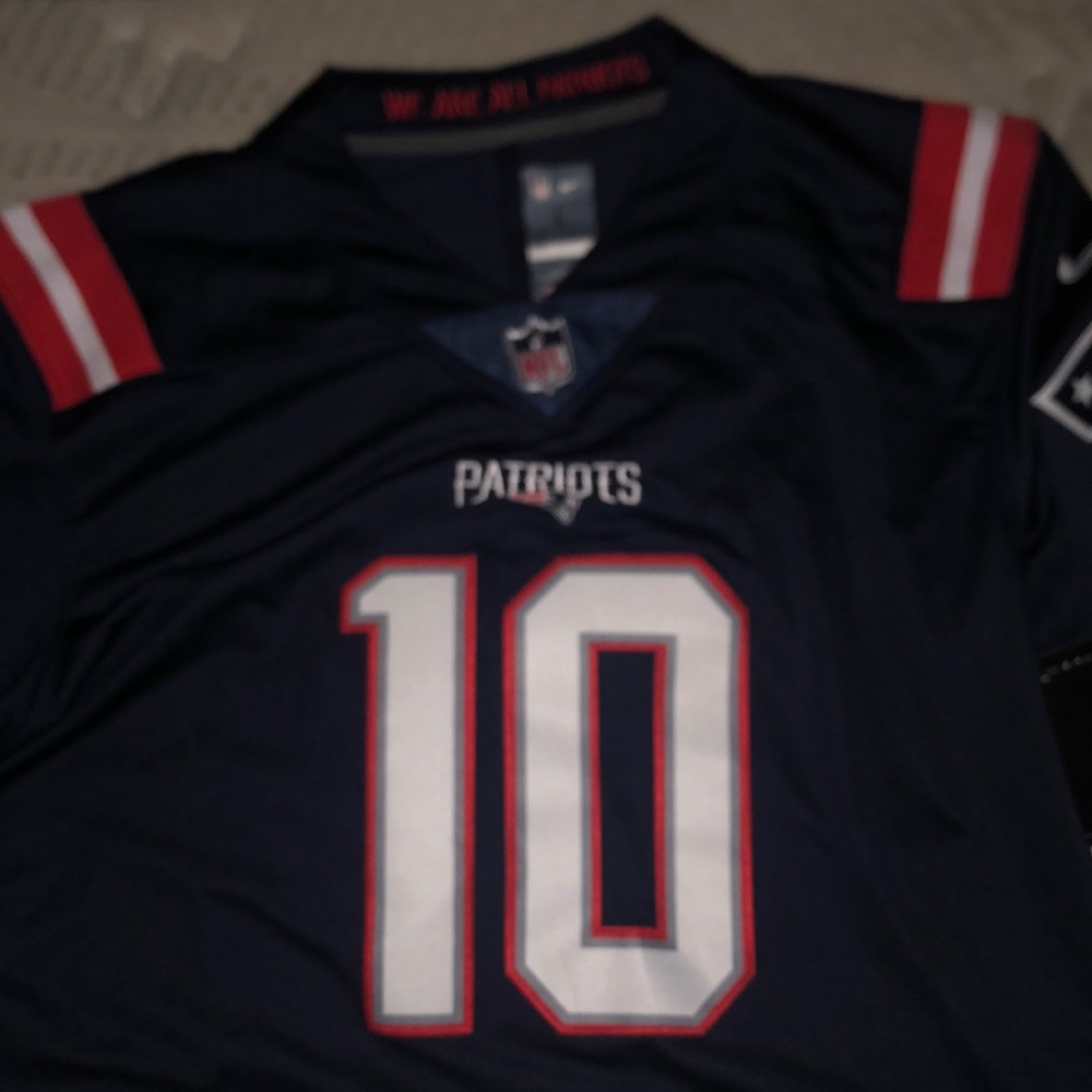 Mac Jones Patriots Football Jersey new with tags on.